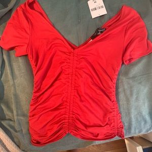 Red off the shoulder shirt